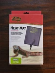 Zilla (#100109937) Reptile 6" X 8" Small Heating Pad, 10-20 Gallon. Fixed Price $18.99.