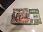 Metal Window Bird Feeder With Strong Suction Cups Curved Design. Fixed Price $19.99.