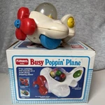 Vintage 1988 Playskool Baby Busy Poppin Toy Box Interactive Airplane. Fixed Price $30.00.