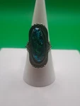 Ring Silver Adjustable With Large Oval Green Stone Size 7 Item # 92. Fixed Price $6.99.
