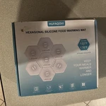 Hufaqovi Hexagonal Silicone Food Warming Mat. Fixed Price $35.00.